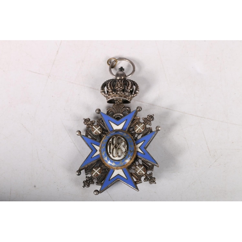 98 - Russian enamel and white metal medal with Maltese cross with saint and dated 1883, 6cm. 