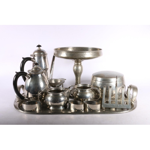 375 - Large quantity of Liberty and Co. Tudric pewter to include tazza, 19cm, coffee tea service, toast ra... 