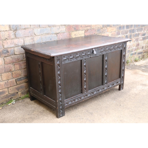 547 - 19th century chip carved oak hinge top blanket box with triple fielded panel front, raised on straig... 