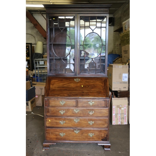 553 - George III mahogany bureau bookcase, the dental work cornice above finger scalloped frieze over a pa... 