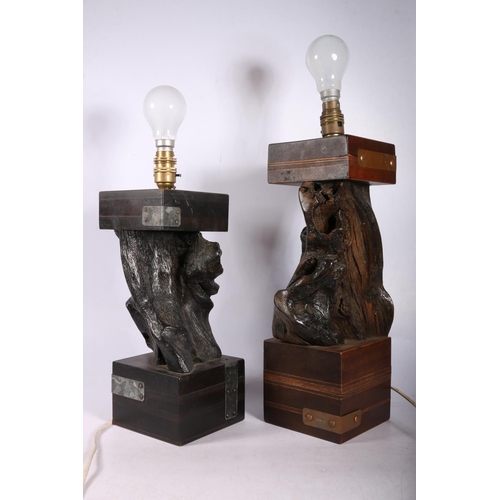 357 - Two table lamps with stems formed of unworked wood and topped with block tops on  block bases, 43cm ... 