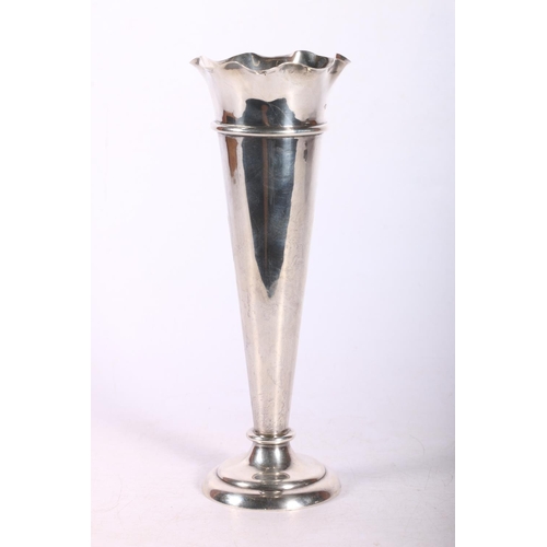 27 - Edward VII silver bud vase of tapering form and weighted, hallmarked William Comyns & Sons,... 