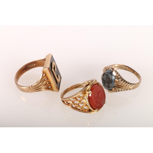 128 - 9ct gold signet ring with hematite intaglio size P, and another with a carnelian seal, and another 1... 