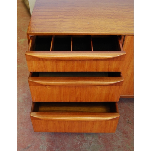 339 - Mid-century teak sideboard by McIntosh & Co., Kirkcaldy with two central cupboard doors enclosin... 