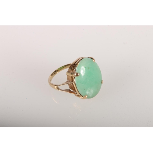 102 - Yellow metal dress ring with jadeite cabochon, size K, 4 g. 