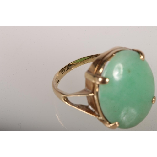 102 - Yellow metal dress ring with jadeite cabochon, size K, 4 g. 