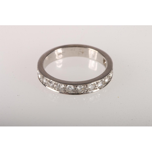 104 - 18ct white gold eternity ring with 12 diamonds, size M/N, 4.2g. 