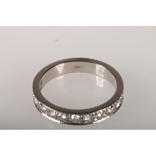 104 - 18ct white gold eternity ring with 12 diamonds, size M/N, 4.2g. 