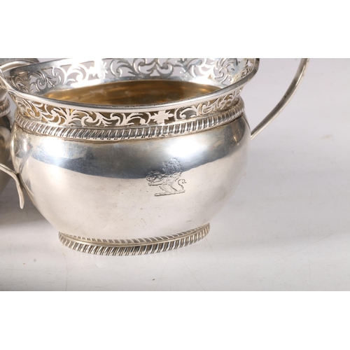 40B - Edward VII silver bachelor tea service with foliate pierced rims and lion rampant to sides, hallmark... 