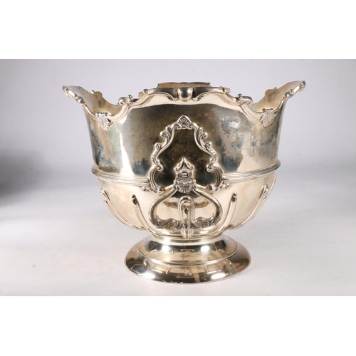 81 - Edwardian silver rose bowl, having a Monteith style shaped edge with moulded decoration, on socle ba... 