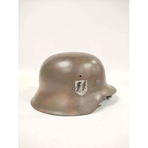 212 - German Third Reich. M1935 stahlhelm with Waffen S.S runic shield (first type) to right side and fini... 