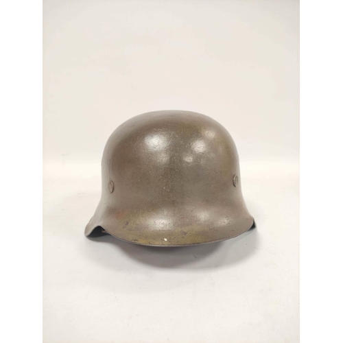 212 - German Third Reich. M1935 stahlhelm with Waffen S.S runic shield (first type) to right side and fini... 