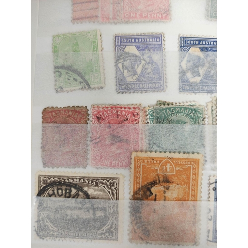 234 - Australia and New Zealand. Three collector's stamp albums to include earlr regional Australian issue... 