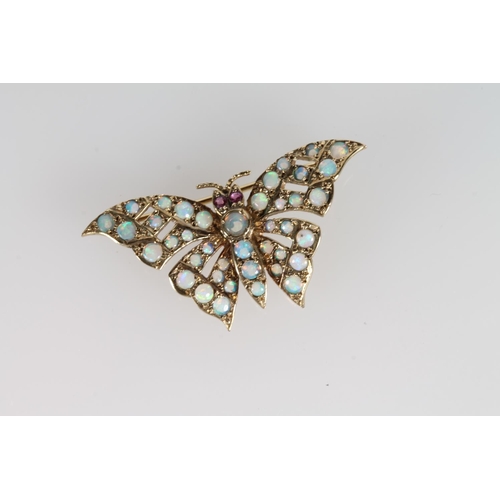 135 - 9ct gold opal and ruby set butterfly brooch by HBJ, 4cm across the wings, 4.3g.