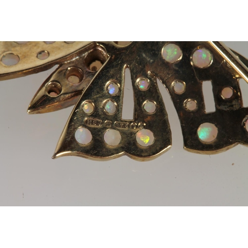 135 - 9ct gold opal and ruby set butterfly brooch by HBJ, 4cm across the wings, 4.3g.