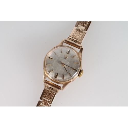 138 - Ladies 9ct gold Omega wristwatch with 17 jewel calibre 245 movement, serial number 18781033, on 9ct ... 