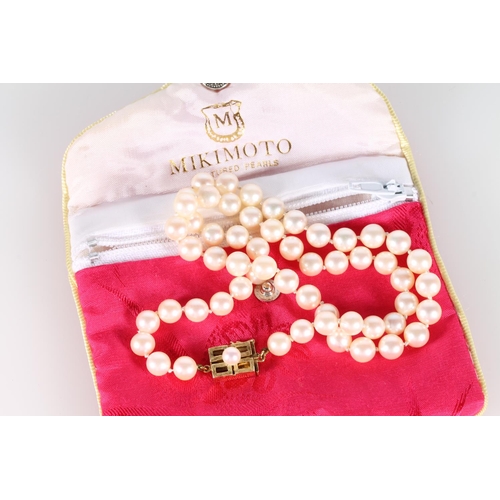 142 - Mikimoto pearl necklace with 14ct gold closure.