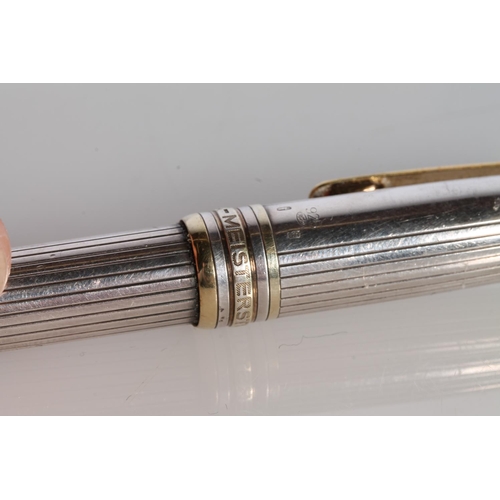 183 - Montblanc Meisterstuck ball point silver pen, marked 925 with a bird hallmark, yellow metal mounts m... 