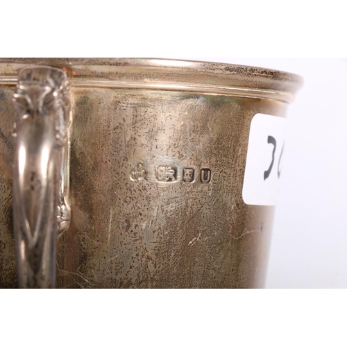 30 - Silver prize footed cup with lion handles to sides inscriptions include Charlton Stadium Blackwall S... 