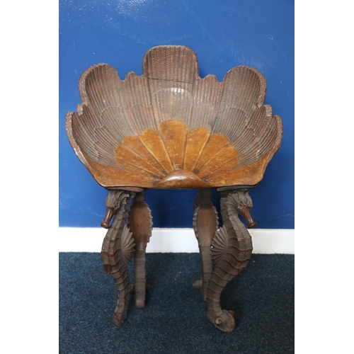 567 - Italian mahogany grotto stool, the seat is in the form of a scallop shell raised on four seahorse sh... 