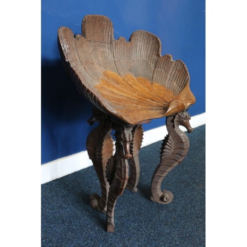 567 - Italian mahogany grotto stool, the seat is in the form of a scallop shell raised on four seahorse sh... 