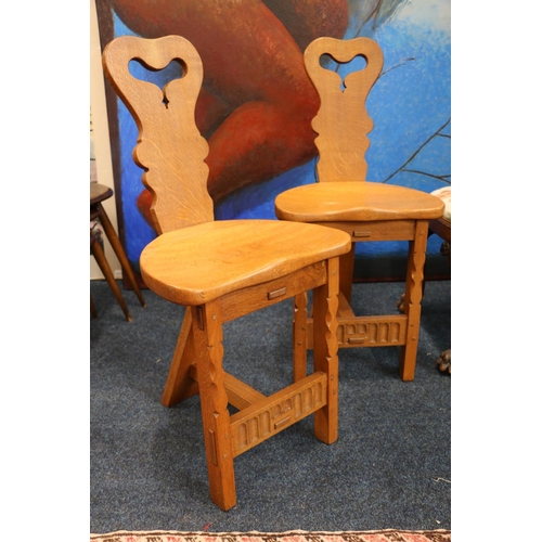 568 - Pair of Arts & Crafts style oak cottage chairs in the manner of Rupert Griffiths of Derbyshire. ... 