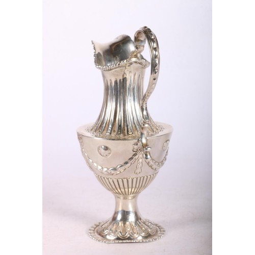 53 - Georgian silver jug of classical form, hallmarks rubbed, 17cm, 165g. 