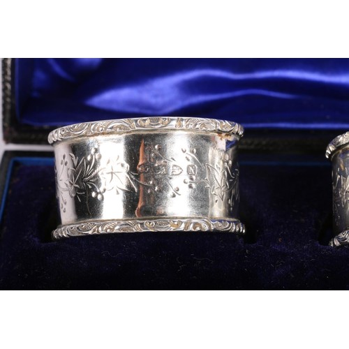 64 - Victorian silver napkin rings with foliate decoration hallmarked Florence Warden, Chester 1896,... 