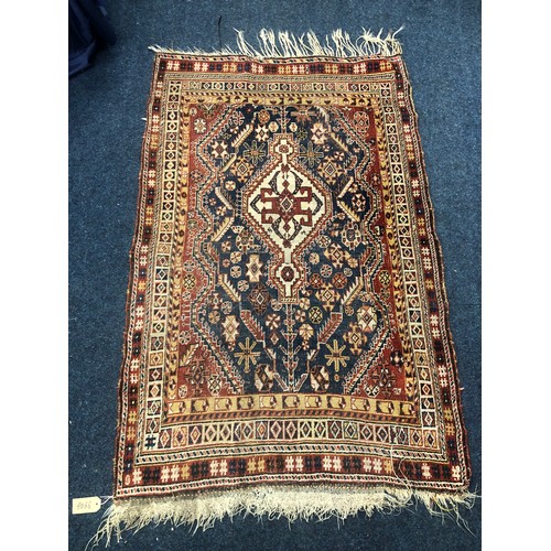 561 - North west Persian rug with stylized flowerheads to field and multiple borders, 167 x 113.