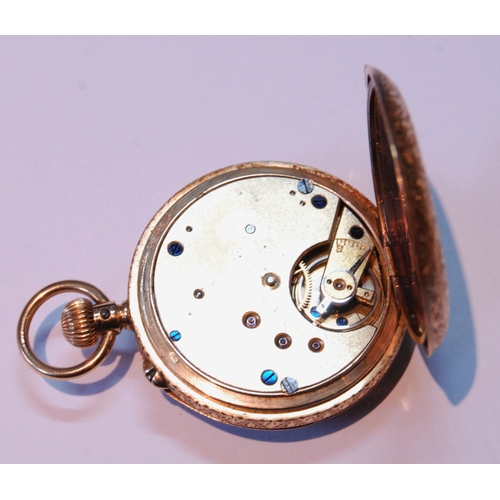 111 - Geneva keyless lever watch with engraved dial and open face case, '18k', 35mm.