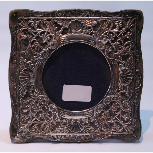 104 - Silver-mounted photograph frame, Birmingham 1903, 17.5cm square.