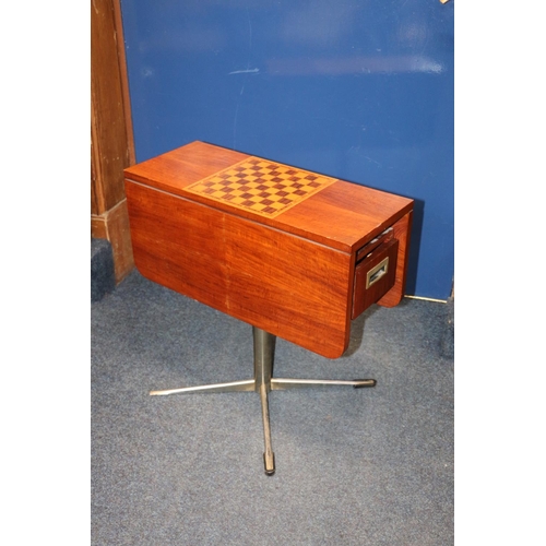 100A - 1970's inlaid drop leaf games table with single drawer accessible from either end on metal support 5... 