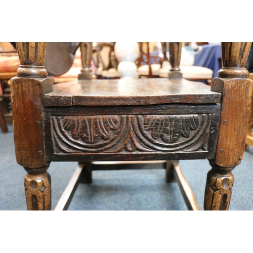 50A - English Oak metamorphic Monks chair with rectangular seat and circular table on carved and turned su... 