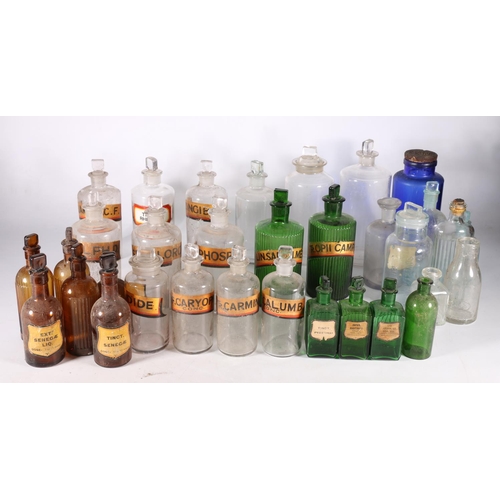 70A - Collection of thirty three glass apothecary bottles, including green, Bristol blue, brown , clear, s... 