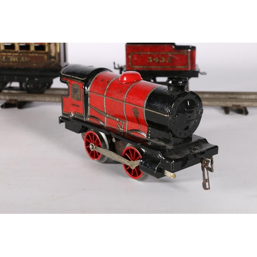 90A - Vintage Hornby series Meccano Clockwork train set with carriages and track.