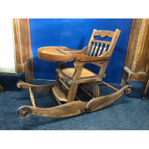 150A - C. 1900 child's metamorphic highchair with iron mechanism folding down to form rocking chair, 64 x 8... 