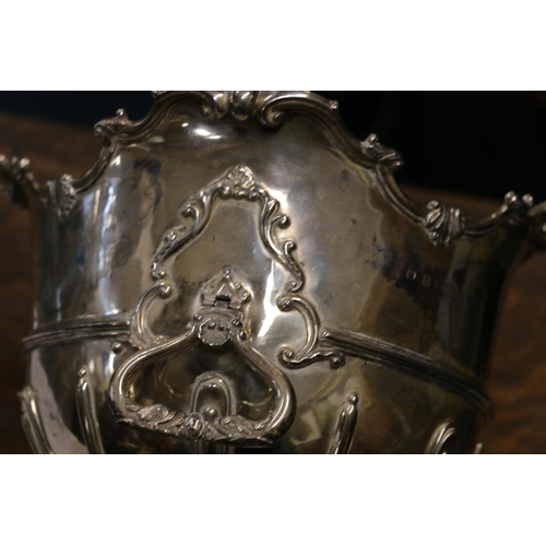 81 - Edwardian silver rose bowl, having a Monteith style shaped edge with moulded decoration, on socle ba... 