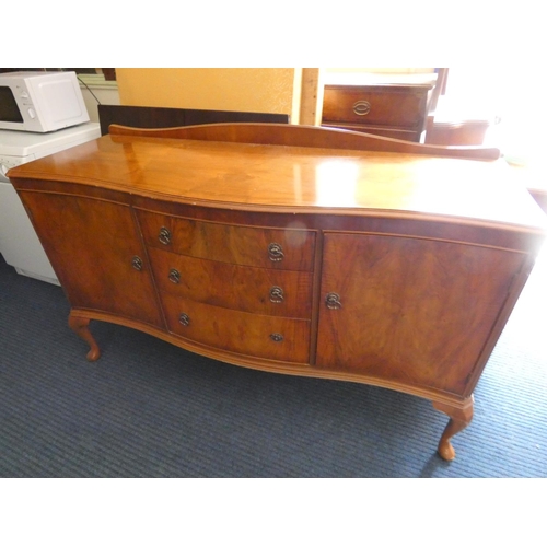 560 - Large two door sideboard with three drawers.