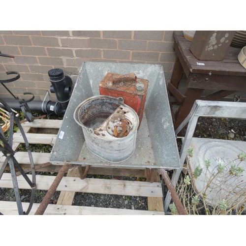 570 - Galvanised wheel barrow, mop, bucket, petrol can.