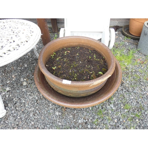 576 - Large salt glaze planter and base.