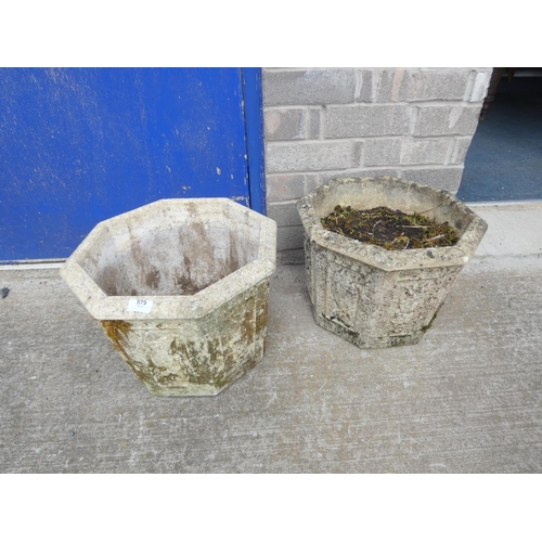 579 - Pair of concrete planters.