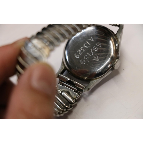 240 - Omega military wristwatch, inscribed 6B/159 bellow broad arrow and numbered A13329, back not removed... 