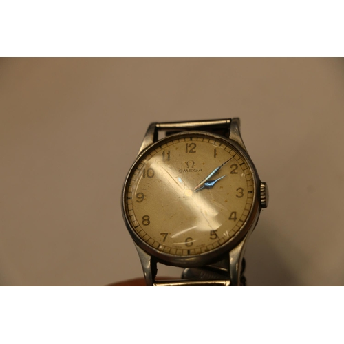 240 - Omega military wristwatch, inscribed 6B/159 bellow broad arrow and numbered A13329, back not removed... 