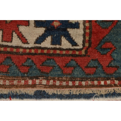 557 - Kazak designed rug with three medallions to field within multiple borders, 178 x 133cm, and a smalle... 