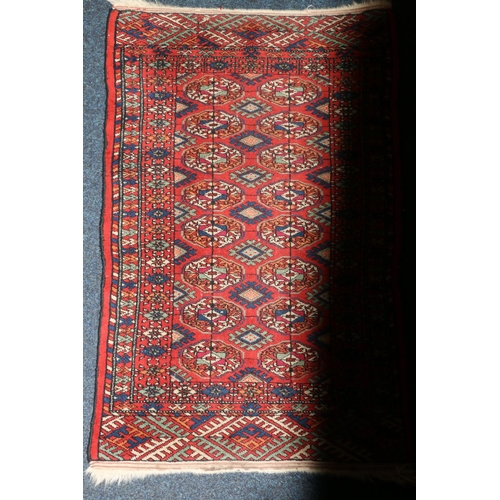 557 - Kazak designed rug with three medallions to field within multiple borders, 178 x 133cm, and a smalle... 