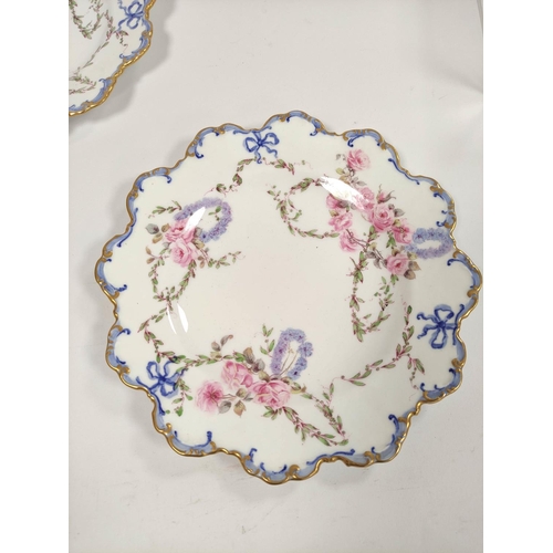 282 - Set of eight Royal Crown Derby fruit plates with shaped gilt rims, decorated with underglazed pink c... 