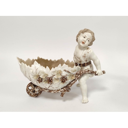 287 - Pair of 19th century Continental porcelain sweetmeat baskets modelled as putti with decorative wheel... 