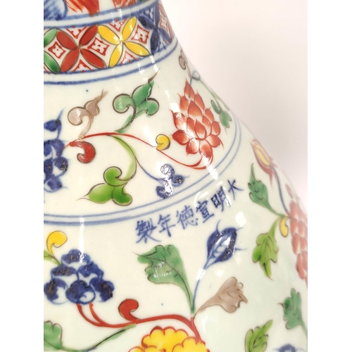 334 - Chinese 20th century Qianlong revival porcelain vase of baluster shape, Decorated with colourful pol... 