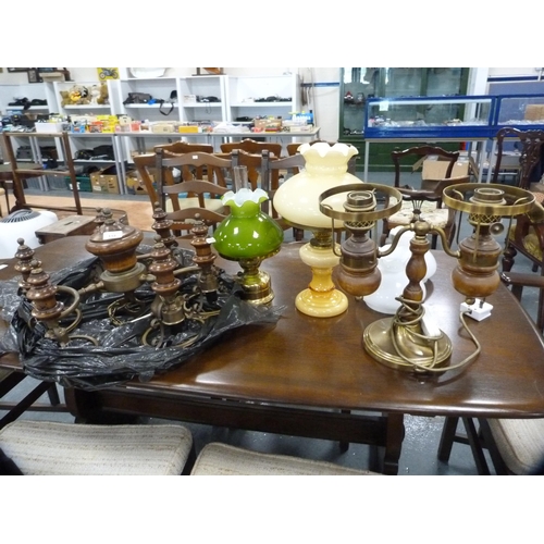 118 - Turned wood and brass ceiling light and three other lamps.