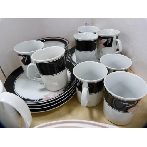 129 - Susie Cooper part tea set and a continental coffee set.